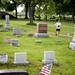 A runner jogs and warms up in St. Joseph Cemetery adjacent to the staging area of the Dexter-Ann Arbor half marathon on Sunday, June 2. Daniel Brenner I AnnArbor.com